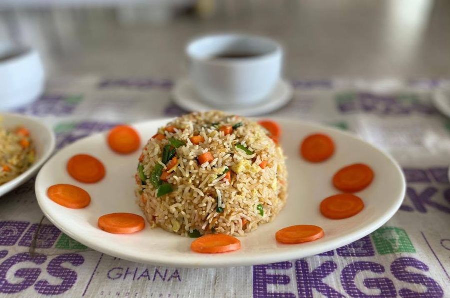 Vegetable fried rice moulded and garnished with carrot rounds